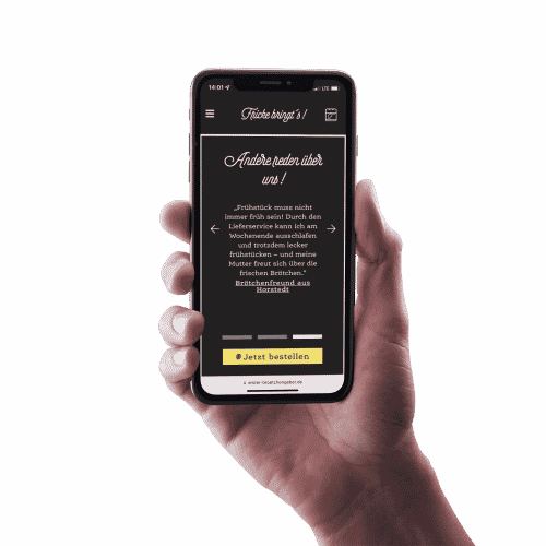 male-hand-holding-a-black-iphone-x-mockup-against-a-transparent-backdrop-a14135 (2)